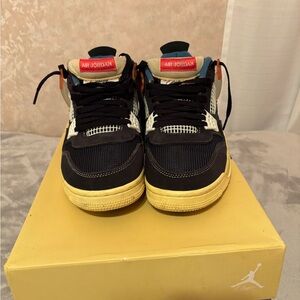 Jordan 4 unions Black and Cream Sneakers